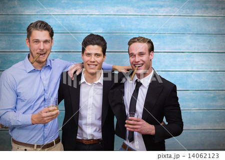 Composite image of handsome friends having a drink together Composite image of handsome friends having a drink together 14062123