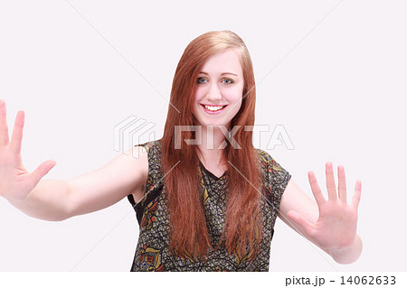 Beautiful girl smiling showing palms 14062633