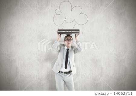 Composite image of handsome businessman sheltering with briefcas Composite image of handsome businessman sheltering with briefcas 14062711