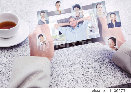Composite image of cheerful creative business employee resting Composite image of cheerful creative business employee resting 14062734