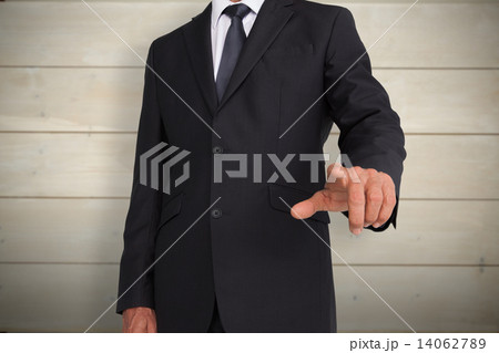 Composite image of businessman pointing Composite image of businessman pointing 14062789