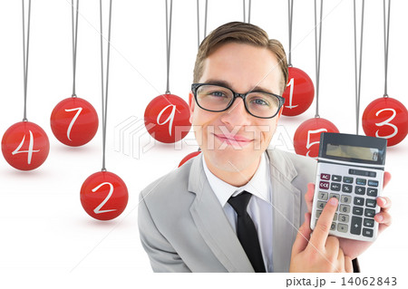 Composite image of geeky smiling businessman showing calculator Composite image of geeky smiling businessman showing calculator 14062843