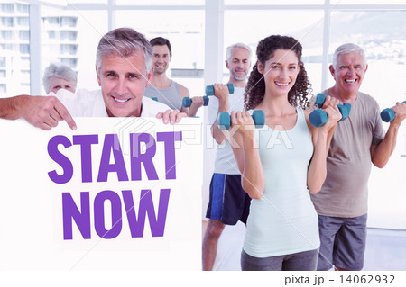 Composite image of casual man showing a poster 14062932