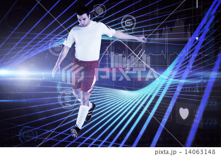 Composite image of football player in white kicking 14063148