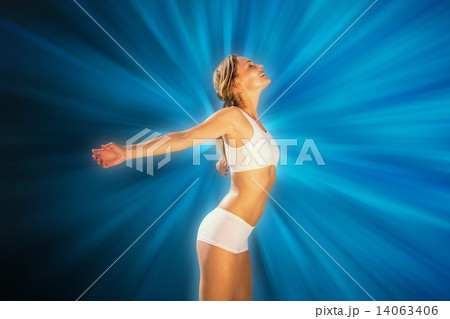Composite image of gorgeous fit blonde standing with arms out 14063406