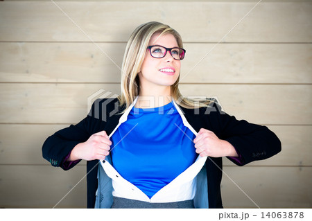 Composite image of businesswoman opening her shirt superhero sty Composite image of businesswoman opening her shirt superhero sty 14063878