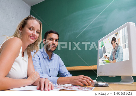 Composite image of artist drawing something on graphic tablet wi Composite image of artist drawing something on graphic tablet wi 14063922