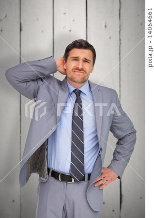Composite image of thinking businessman 14064661