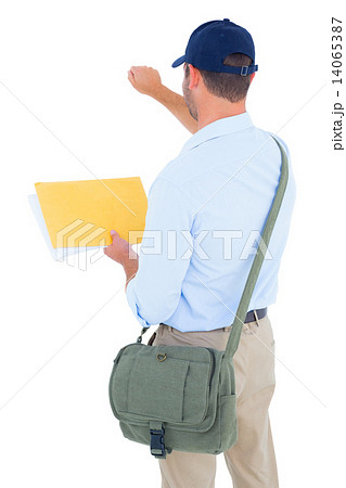 Postman with letter knocking on white background 14065387