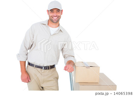 Confident delivery man with cardboard boxes Confident delivery man with cardboard boxes 14065398