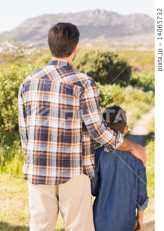 Father and son on a hike together 14065732