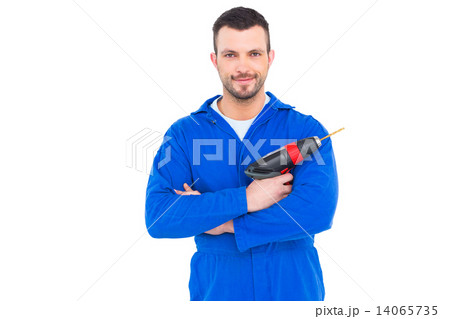 Confident handyman holding power drill 14065735