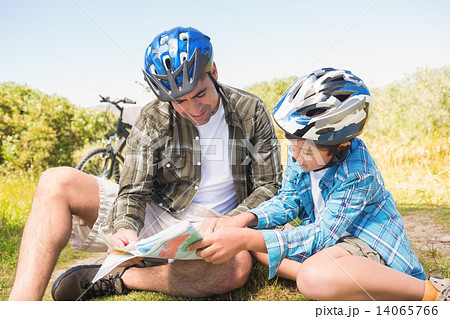 Father and son hiking in the mountains 14065766