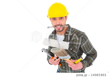 Manual worker holding various tools Manual worker holding various tools 14065903