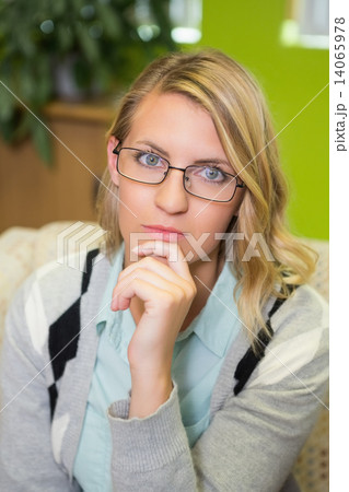 Pretty student thinking in library Pretty student thinking in library 14065978