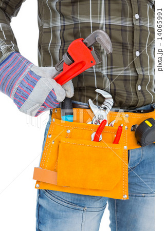Handyman holding hand tool 14065991