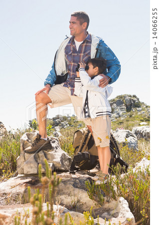 Father and son hiking in the mountains 14066255