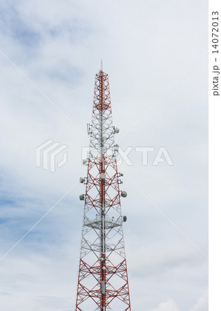 Mobile phone communication antenna tower with the blue sky and clouds 14072013