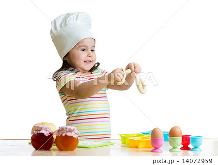 Making dough is fun. Little chid playing with flour. 14072959