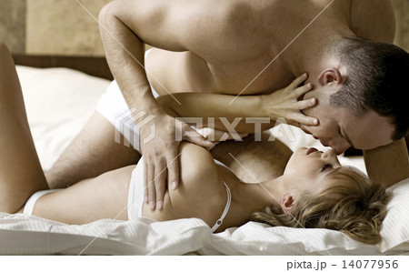 young couple in bed young couple in bed 14077956