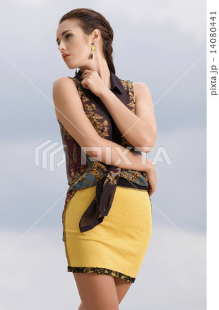 beautiful girl on background blue sky 14080441