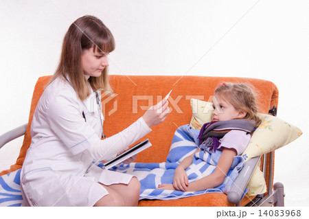 Pediatrician about sick girl looking at a thermometer 14083968