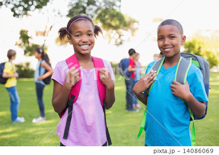 Happy friends playing in the park 14086069