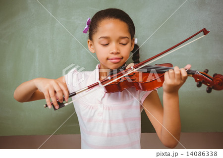 Portrait of cute little girl playing violin 14086338