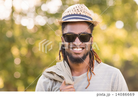 Handsome hipster in the park Handsome hipster in the park 14086669