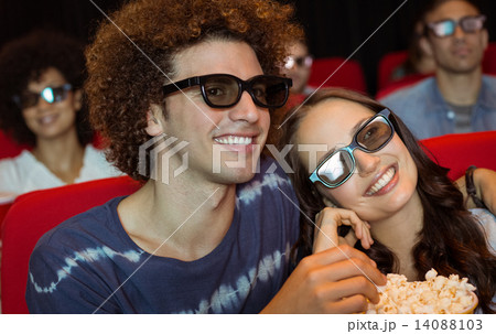 Young couple watching a 3d film Young couple watching a 3d film 14088103