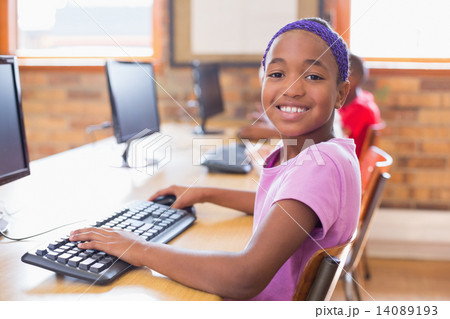 Cute pupils in computer class Cute pupils in computer class 14089193