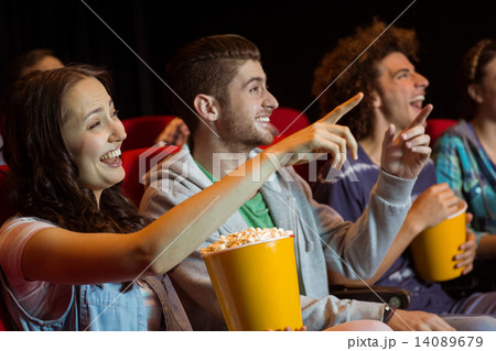Young friends watching a film 14089679