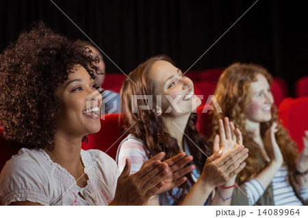 Young friends watching a film 14089964