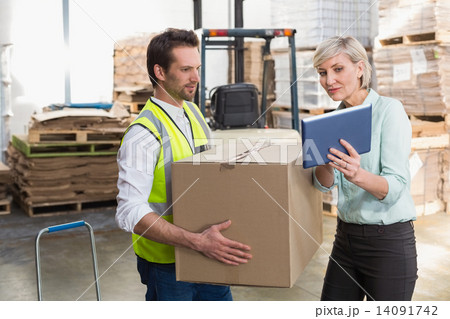 Warehouse worker and manager using tablet pc 14091742