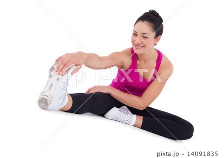 Fit woman stretching her legs 14091835