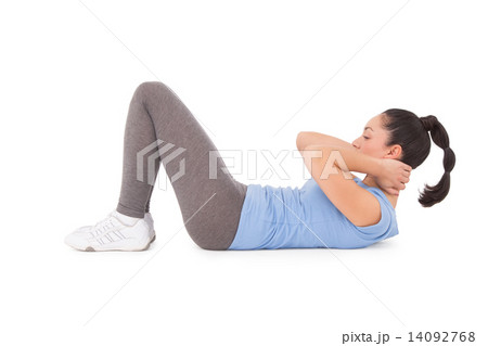 Fit brunette doing sit ups 14092768