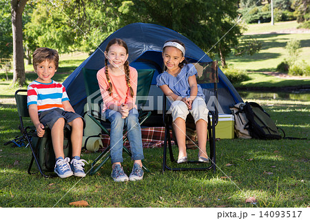 Happy siblings on a camping trip 14093517