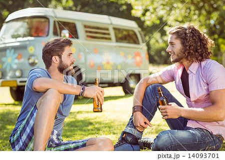 Hipster friends toasting with beers Hipster friends toasting with beers 14093701