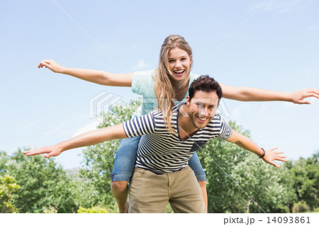Cute couple having fun in park 14093861