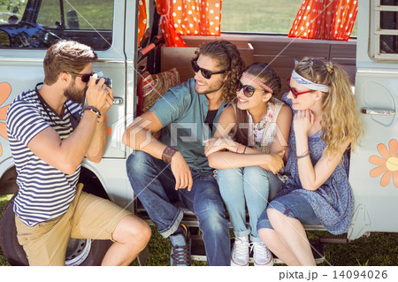 Hipster friends taking a photo Hipster friends taking a photo 14094026