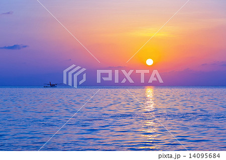 Seaplane at sunset - Maldives 14095684