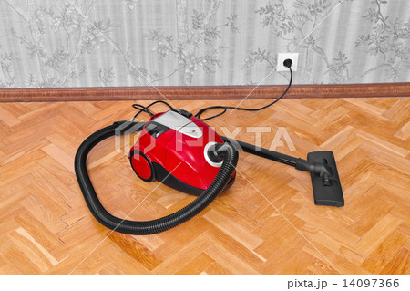 Vacuum cleaner on parquet Vacuum cleaner on parquet 14097366