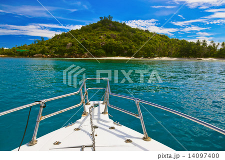 Tropical island and boat on Seychelles Tropical island and boat on Seychelles 14097400