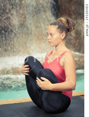 Practicing yoga. Garbhasana Practicing yoga. Garbhasana 14100463
