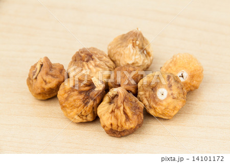 Close up and selective focus on the dried figs at the foreground 14101172
