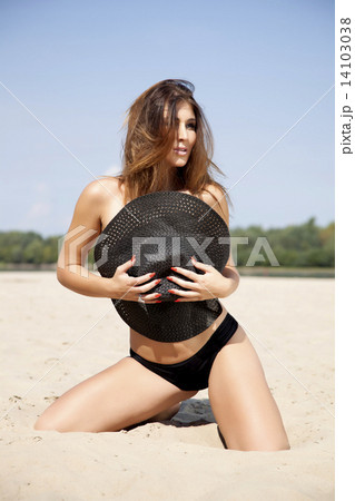 beautiful brunette woman in pink bikini beautiful brunette woman in pink bikini 14103038