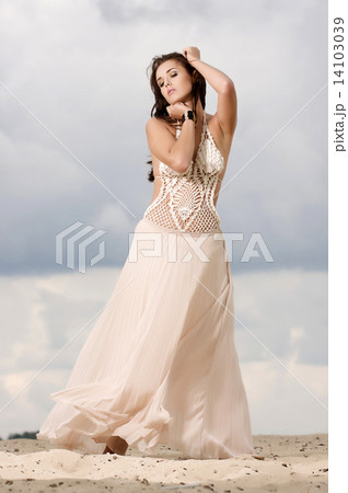 attractive and sensuality woman dancing in the desert attractive and sensuality woman dancing in the desert 14103039
