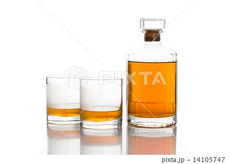 Whiskey bottle with two glasses isolated in white 14105747