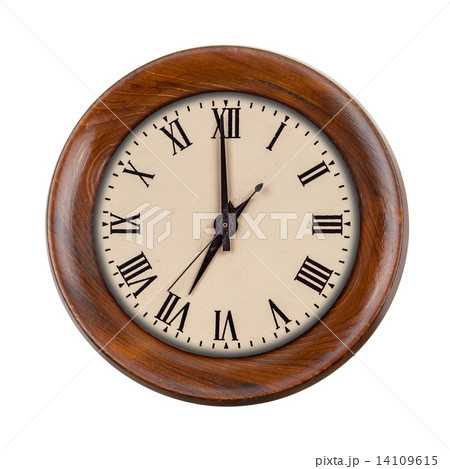 Vintage clockface showing seven o'clock in wooden frame Vintage clockface showing seven o'clock in wooden frame 14109615