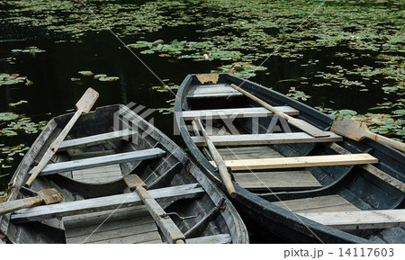Wooden boats on the forest lake Wooden boats on the forest lake 14117603